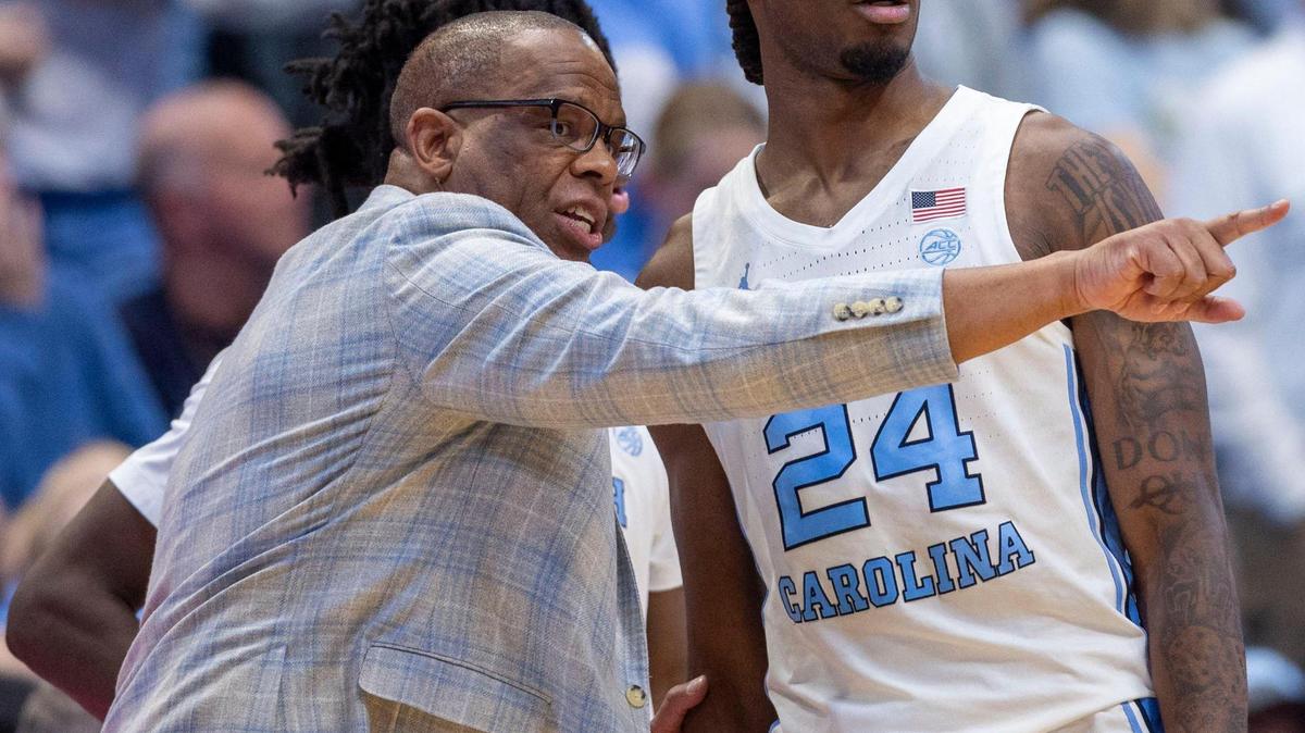 North Carolina coach Hubert Davis has a word with Jae’Lyn Withers (24) in the second half against Georgia Tech on Saturday, Dec. 7, 2024 at the Smith Center in Chapel Hill, N.C. Withers was a sparkplug for UNC in the Tar Heels’ game at Syracuse on Saturday, Feb. 15, 2025.