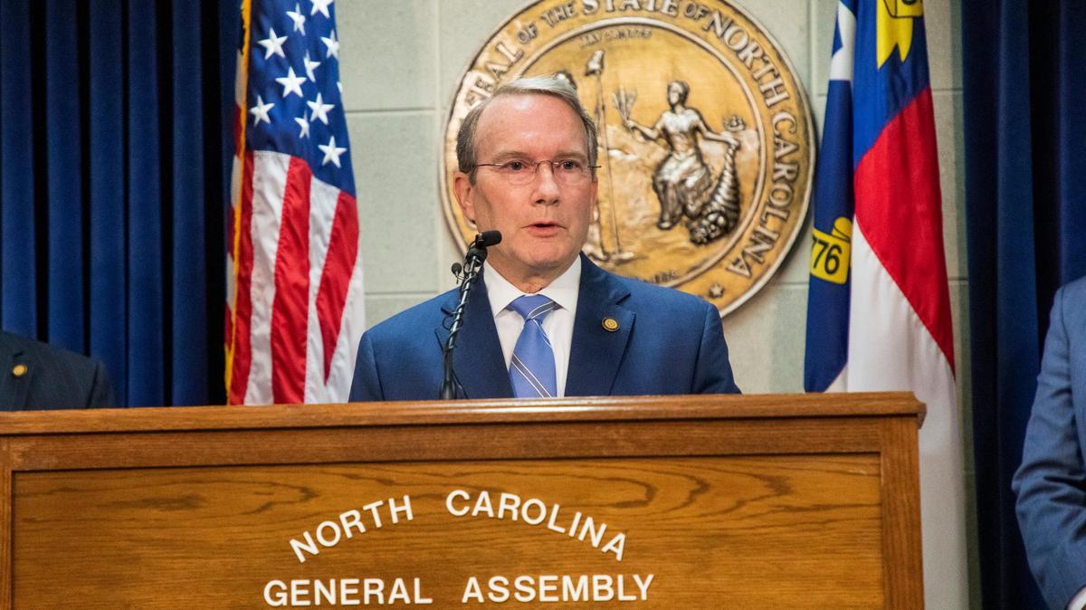 State Sen. Paul Newton explains a new proposal to cut taxes with fellow Senate Finance Committee Chairs Sen. Bill Rabon and Sen. Warren Daniel at the North Carolina General Assembly Building, on Tuesday, May 25, 2021, in Raleigh, N.C.