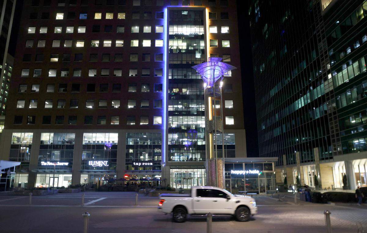 Buildings in downtown Raleigh, including 421 Fayetteville Street and City Plaza, displayed blue and yellow lights to show support of Ukraine, Wednesday evening, March 2, 2022.