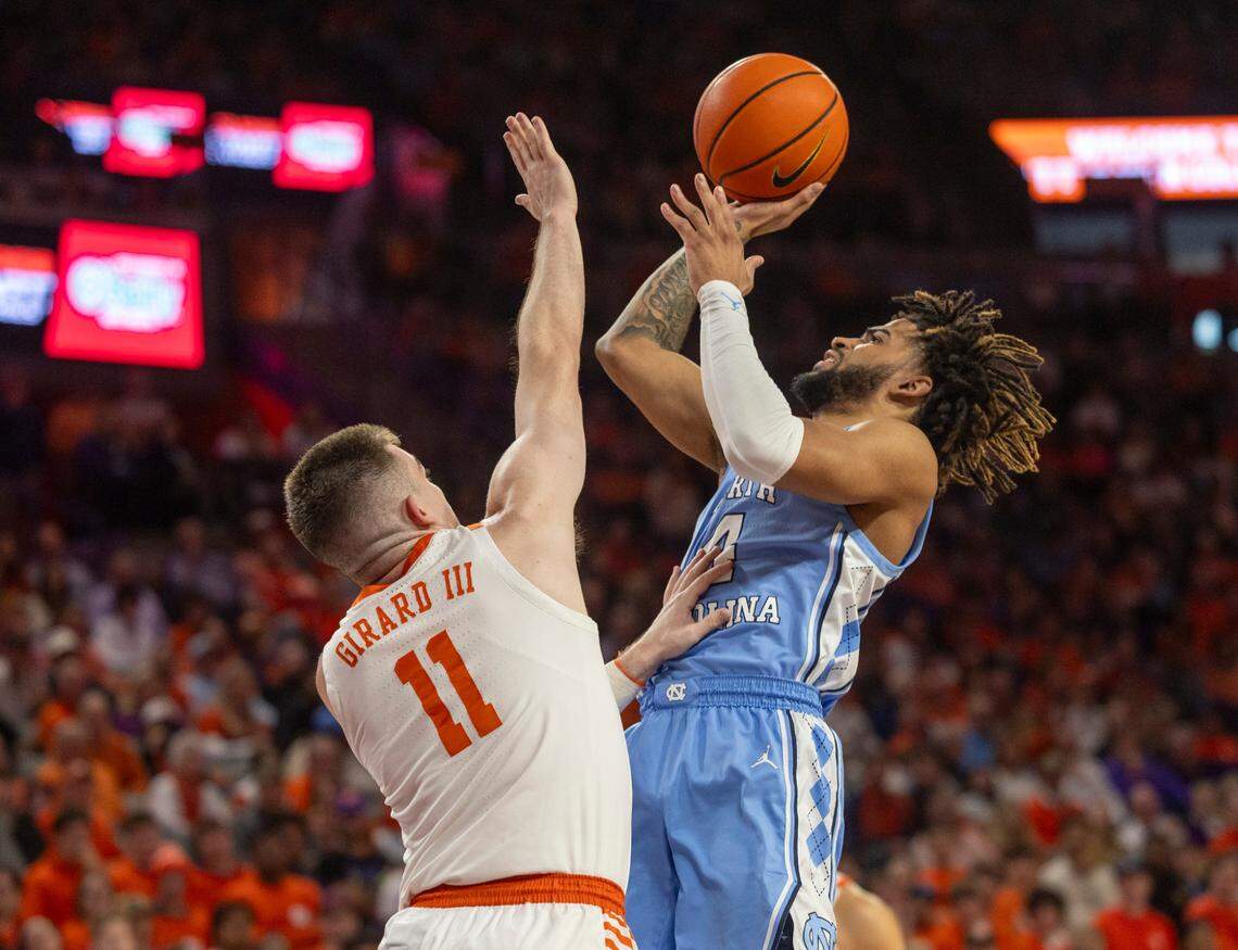 North Carolina’s R.J. Davis (4) puts up a shot against Clemson’s Joseph Girard III (11) in the first half on Saturday, January 6, 2024 at Littlejohn Coliseum in Clemson, S.C.