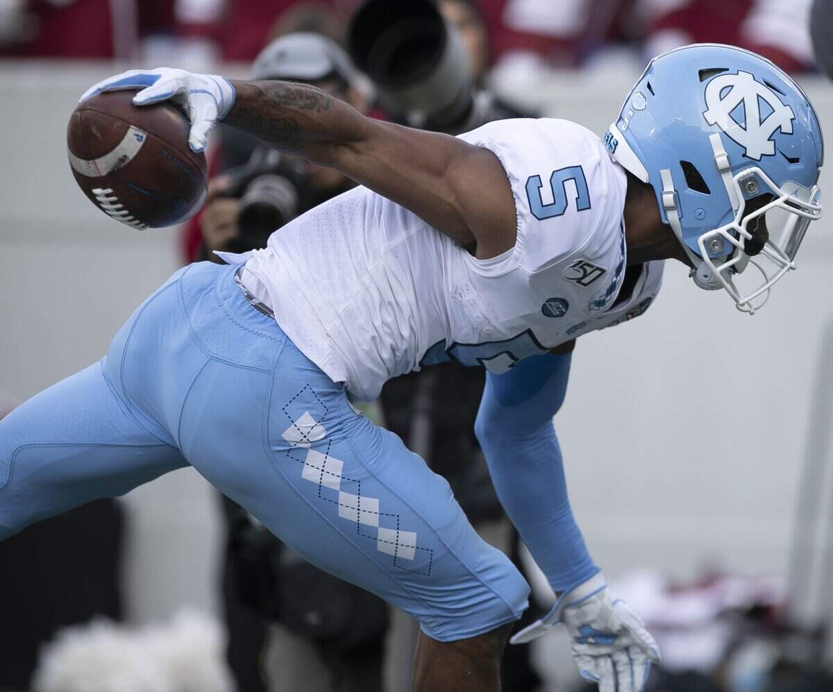 North Carolina’s Dazz Newsome (5) scores on a 16 -yard pass reception from quarterback Sam Howell to give the Tar Heels’ a 17-6 lead over Temple in the Military Bowl on Friday, Dec. 27, 2019 at Navy-Marine Corps Memorial Stadium in Annapolis, Maryland.