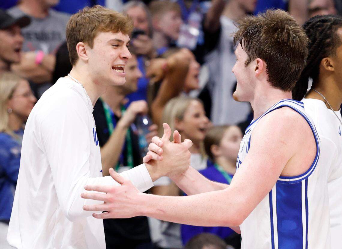 Duke’s Cooper Flagg congratulates Kon Knueppel as he comes off the floor in the final moments of Duke’s 73-62 victory over Louisville in the finals of the 2025 ACC Men’s Basketball Tournament at the Spectrum Center in Charlotte, N.C., Saturday, March 15, 2025.