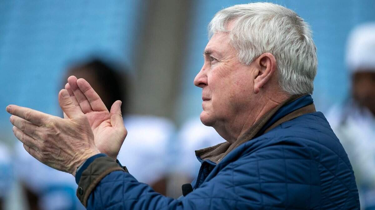 North Carolina coach Mack Brown applauds his players during their spring football game on Saturday, April 9, 2022 at Kenan Stadium in Chapel Hill, N.C.