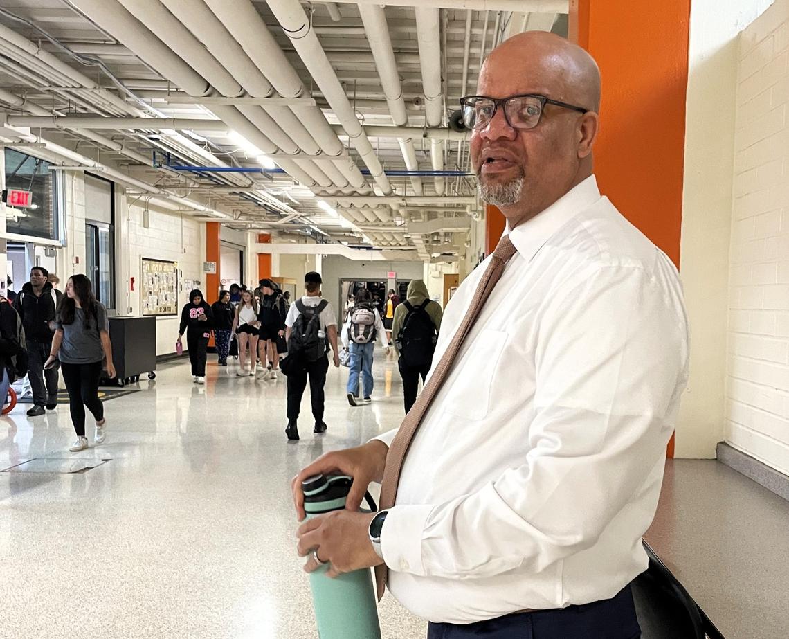 Orange High School Principal Jason Johnson interacts with students during a class change on May 28, 2025, in Hillsborough. Johnson has been named the 2026 National High School Principal of the Year.