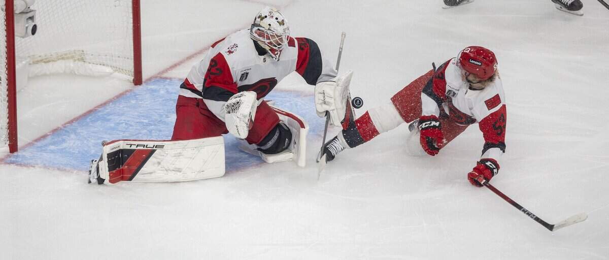 Carolina Hurricanes right wing Jackson Blake (53) assists goalie Brandon Bussi (32) with a save in the second period against Vegas, during Game 6 of the Stanley Cup Final, on Sunday, June 14, 2026 at T-Mobile Arena in Las Vegas, NV.
