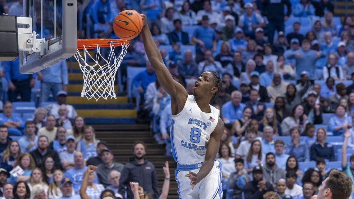 North Carolina forward Caleb Wilson (8) soars above the rim for a dunk during the second half, for two of his game high 23 points, in the Tar Heels’ 73-61 victory over Navy on Tuesday, November 18, 2025 at the Smith Center in Chapel Hill, N.C. North Carolina forward Caleb Wilson (8) soars above the rim for a dunk during the second half, for two of his game high 23 points, in the Tar Heels’ 73-61 victory over Navy on Tuesday, November 18, 2025 at the Smith Center in Chapel Hill, N.C.