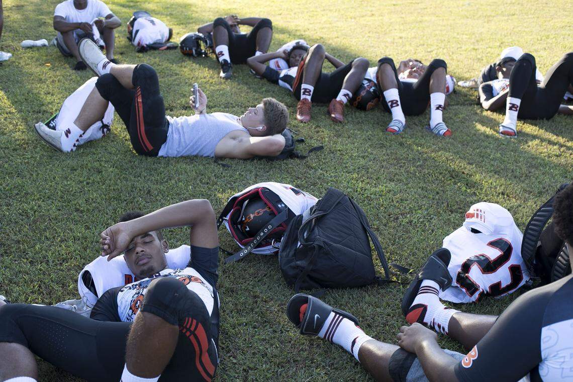 Wallace-Rose Hill’s Jahisien Cruse (53) and his teammates relax before taking the field against Spring Creek for their first football game in nearly a month following Hurricane Florence on Friday, October 5, 2018 in Seven Springs, N.C.