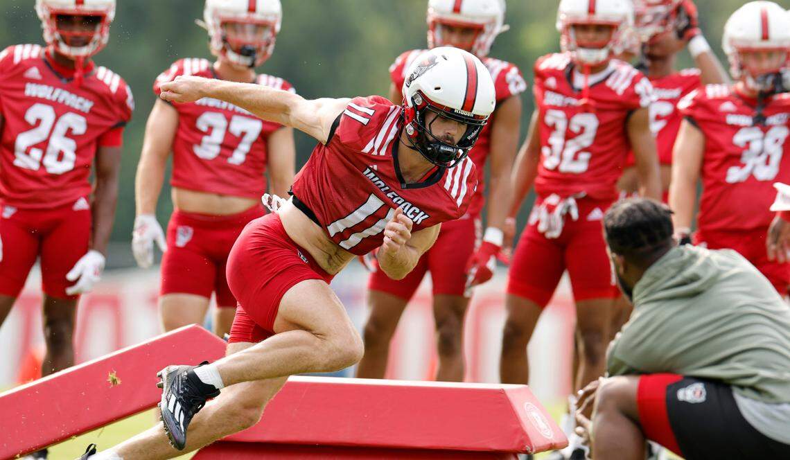 N.C. State linebacker Payton Wilson (11) runs a drill during the Wolfpack’s first fall practice in Raleigh, N.C., Wednesday, August 2, 2023.