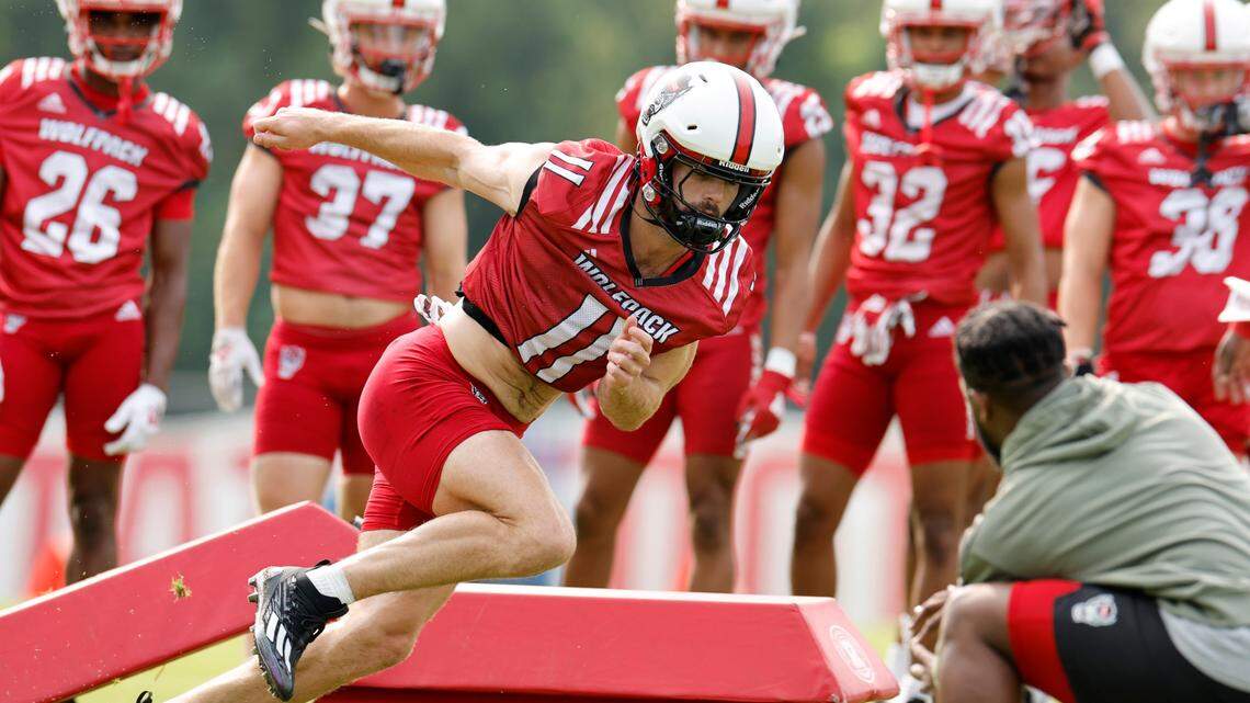 N.C. State linebacker Payton Wilson (11) runs a drill during the Wolfpack’s first fall practice in Raleigh, N.C., Wednesday, August 2, 2023.