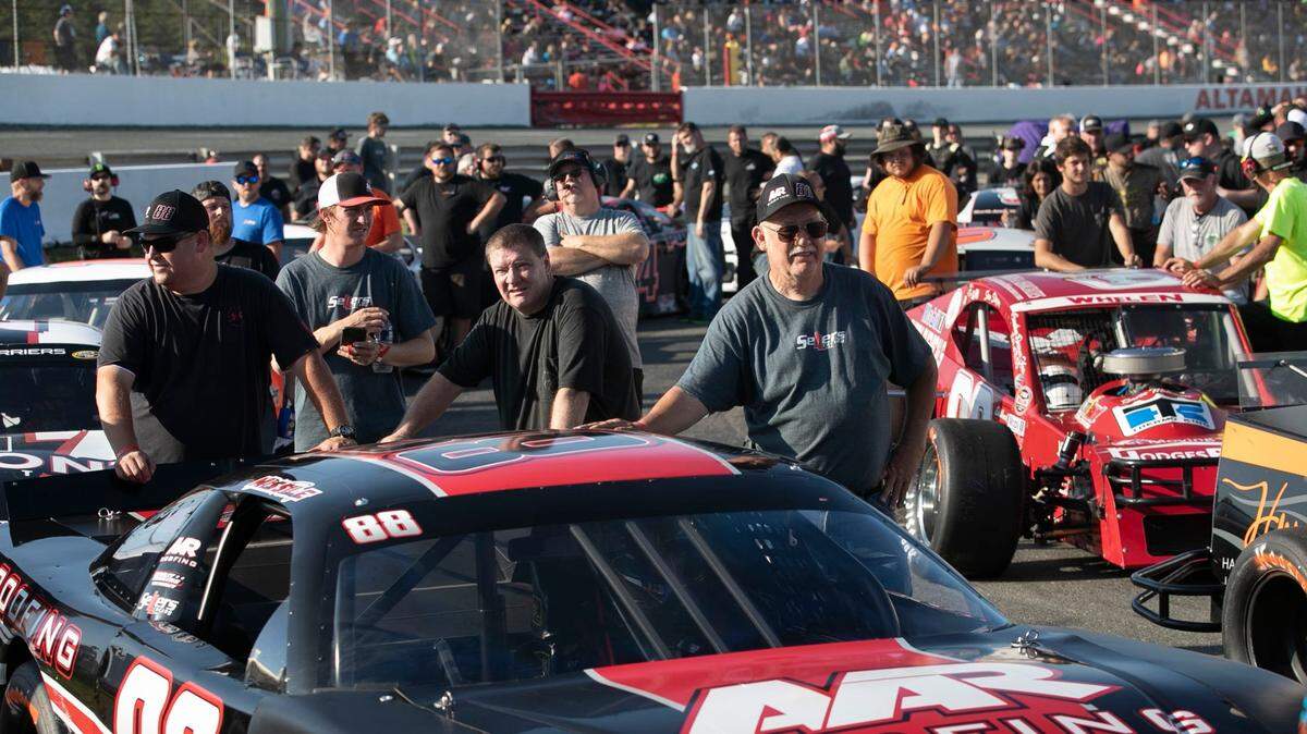 Race teams are jammed together in the infield of Ace Speedway as they line up for qualifying on Saturday, May 23, 2020 in the rural Alamance County community of Altamahaw, near Elon, N.C.