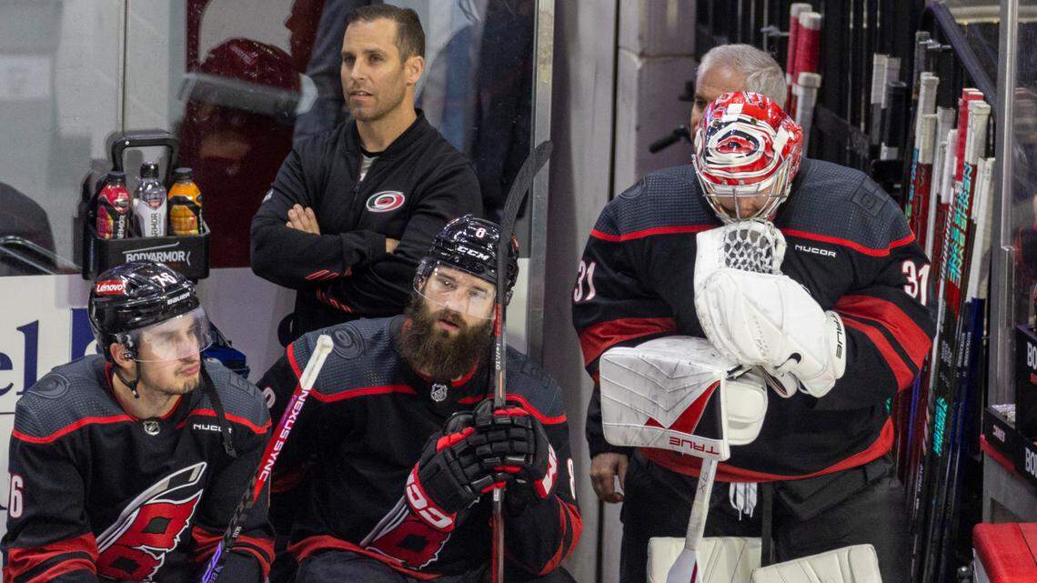 Carolina Hurricanes defenseman Brady Skjei (76), defenseman Brent Burns (8) and goaltender Frederik Andersen (31) react after an empty net goal by the New York Rangers to secure their 5-3 victory and eliminate the Hurricanes from the 2024 Stanley Cup playoffs on Thursday, May 16, 2024 at PNC Arena in Raleigh N.C.