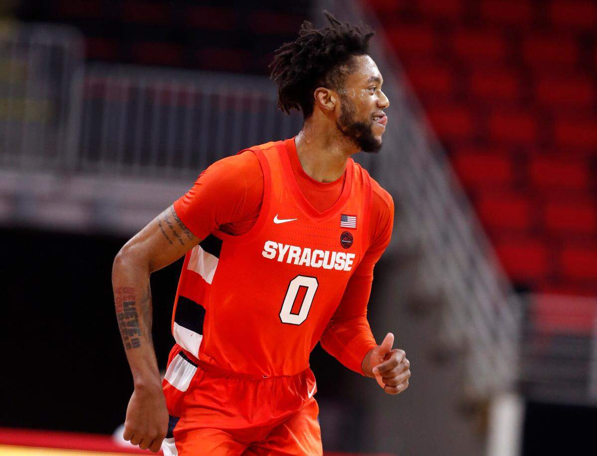 Syracuse’s Alan Griffin (0) celebrates after hitting a three-pointer during the second half of Syracuse’s 77-68 victory over N.C. State at PNC Arena in Raleigh, N.C., Tuesday, February 9, 2021.