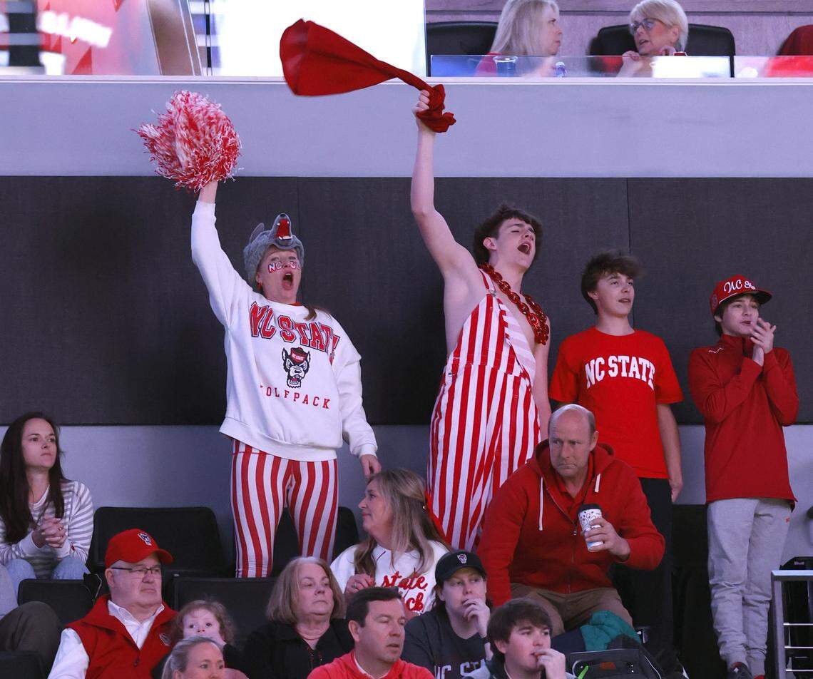 Wolfpack fans cheer on the team in the first half of N.C. State’s game against Virginia in the quarterfinals of the 2026 ACC Men’s Basketball Tournament at the Spectrum Center in Charlotte, N.C., Thursday, March 12, 2026.