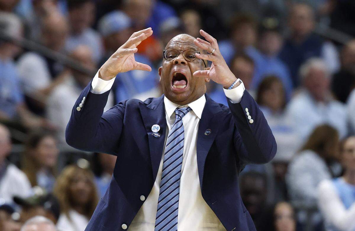 North Carolina head coach Hubert Davis yells to his players during the first half of UNC’s game against VCU in the first round of the NCAA Men’s Basketball Tournament at  Bon Secours Wellness Arena in Greenville, S.C., Thursday, March 19, 2026.
