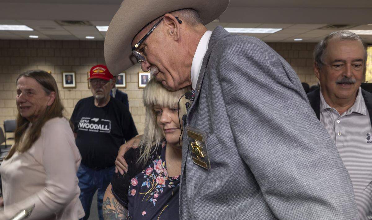 Rockingham County Sheriff Sam Page hugs supporter Bonnie Coker, after previsional ballots in Rockingham County were counted, giving Page a bigger lead over Senate President Pro Tempore Phil Berger on Friday, March 6, 2026 in Reidsville, N.C.