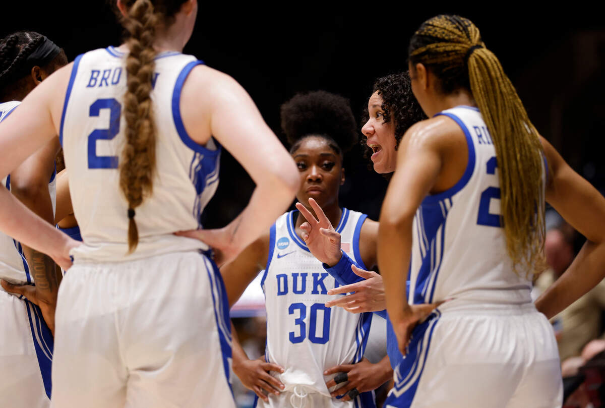 Duke head coach Kara Lawson speaks to her team in the huddle during overtime of the Blue Devils’ 61-53 loss to Colorado in an NCAA Tournament second round game at Cameron Indoor Stadium on Monday, March 20, 2023, in Durham, N.C.