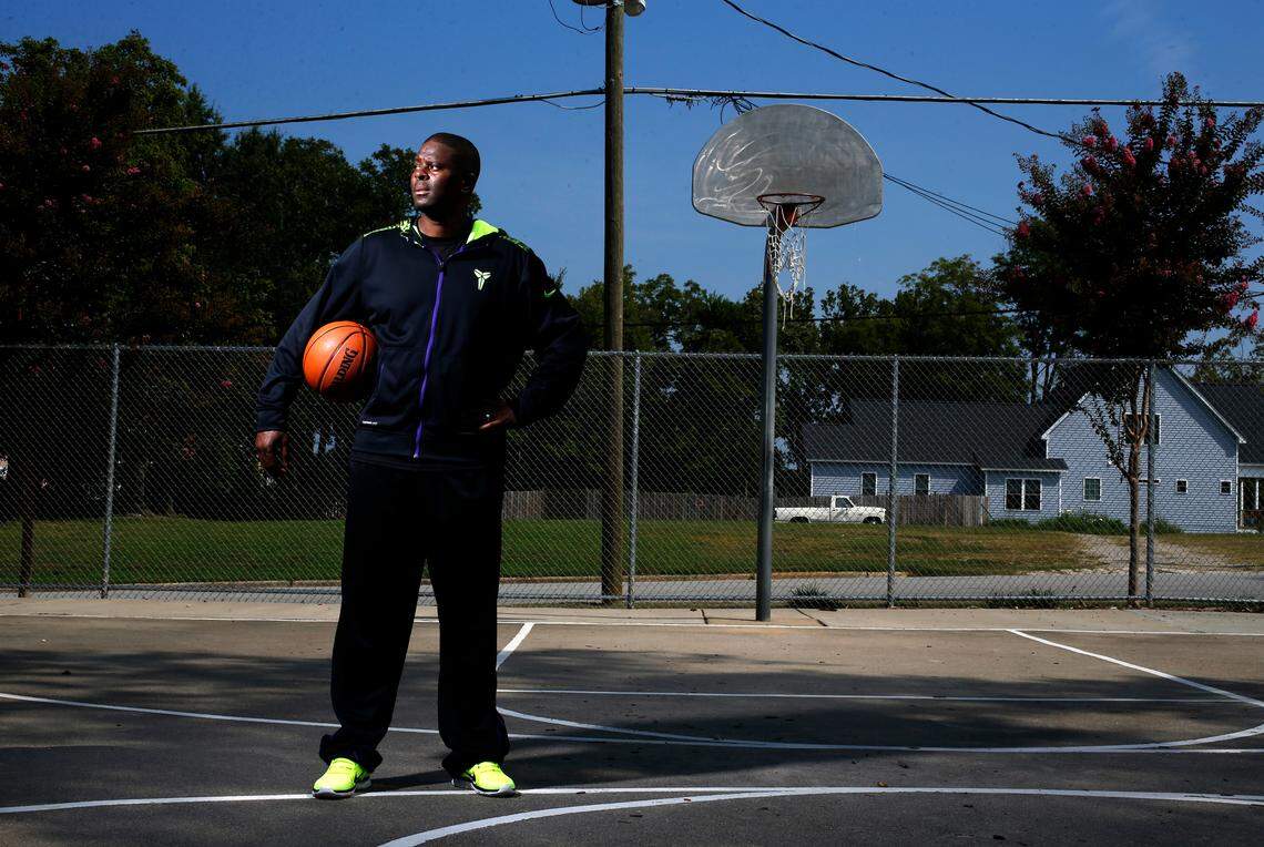 LeVelle Moton poses at the Lane Street Mini Park in Raleigh, Thursday, August 28, 2014. The North Carolina Central University basketball coach grew up playing basketball at the park. In 2019, the City of Raleigh voted to change the name of the park to LeVelle Moton Park.