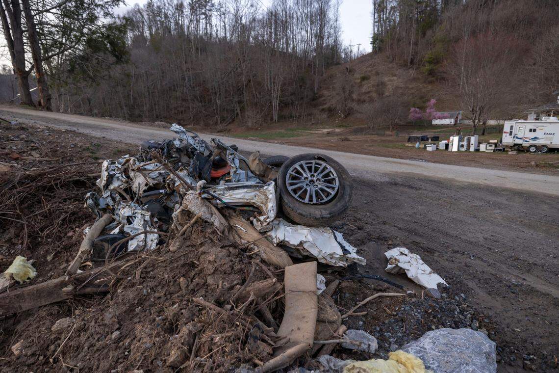 This mangled vehicle belonged to Alison Wisely and her fiance Knox Petrucci. They and Wisely’s two children died in historic flooding on the North Toe River after remnants of Hurricane Helene brought historic destructioin to Western North Carolina. The wreckage remained by Relief Road Extension nearly six months after the storm.