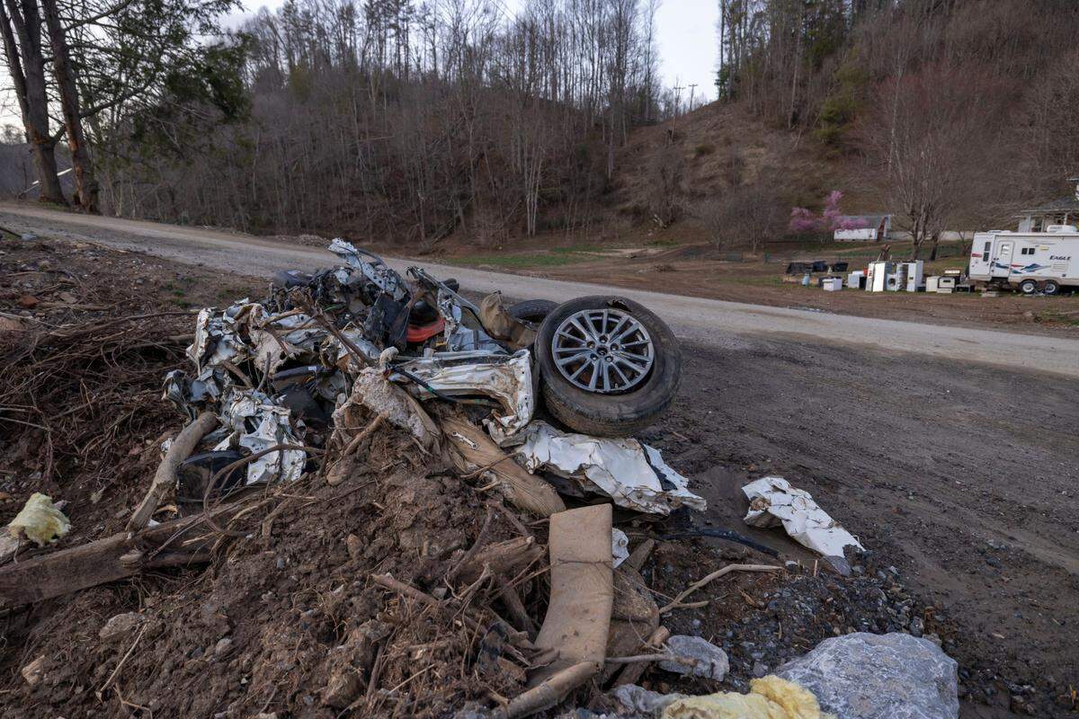 This mangled vehicle belonged to Alison Wisely and her fiance Knox Petrucci. They and Wisely’s two children died in historic flooding on the North Toe River after remnants of Hurricane Helene brought historic destructioin to Western North Carolina. The wreckage remained by Relief Road Extension nearly six months after the storm.