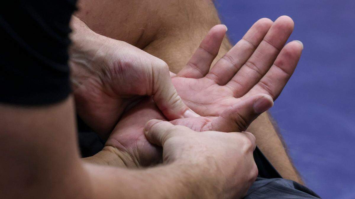 Law enforcement officers train in compliance and control techniques related to use of force at the North Carolina Justice Academy in Salemburg Tuesday, Feb. 8, 2022.