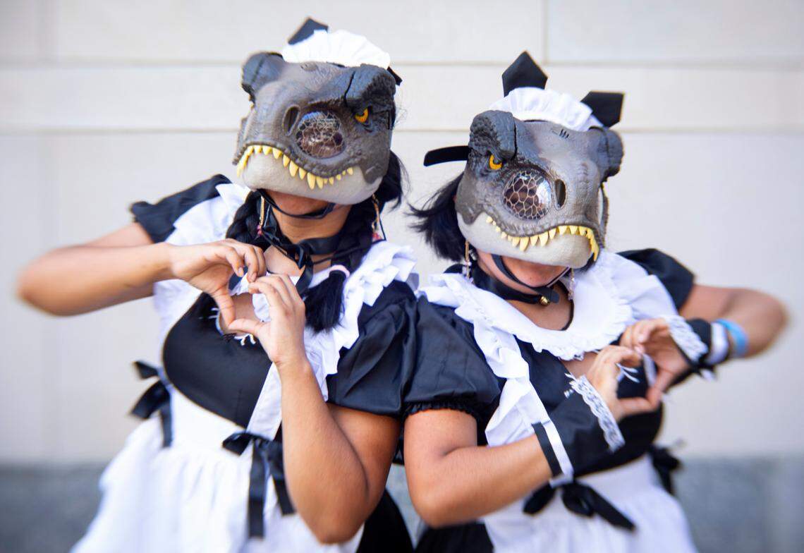 Sisters Shanti (left) and Sonia Lino from Creedmoor pose outside GalaxyCon Raleigh, Friday, July 29, 2023.
