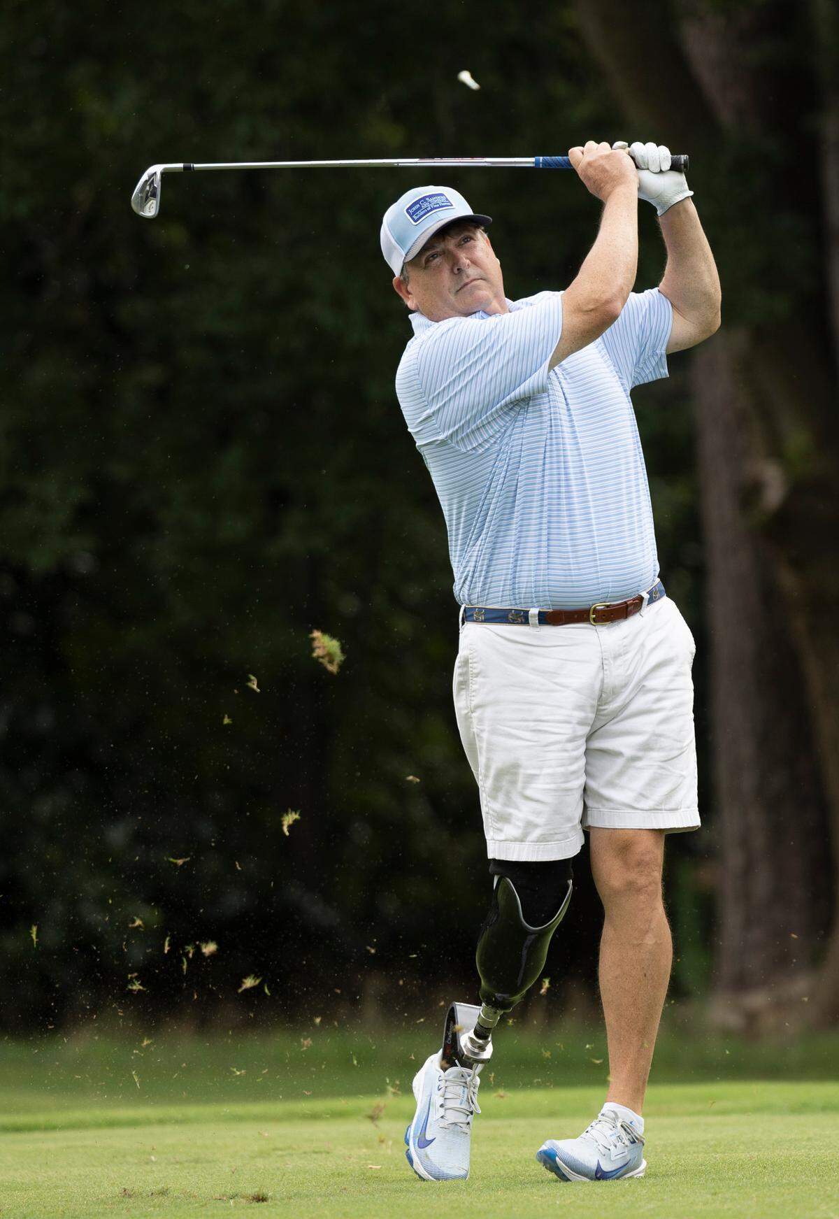 Garrett Smyth, 55, plays a round of golf on Wednesday, July 2, 2025, at Carolina Country Club in Raleigh. Smyth will compete in the U.S. Adaptive Open for the first time this week in Maryland. A four-time bone cancer survivor, he had his right leg amputated below the knee in 2023 and rediscovered his love for competitive golf.