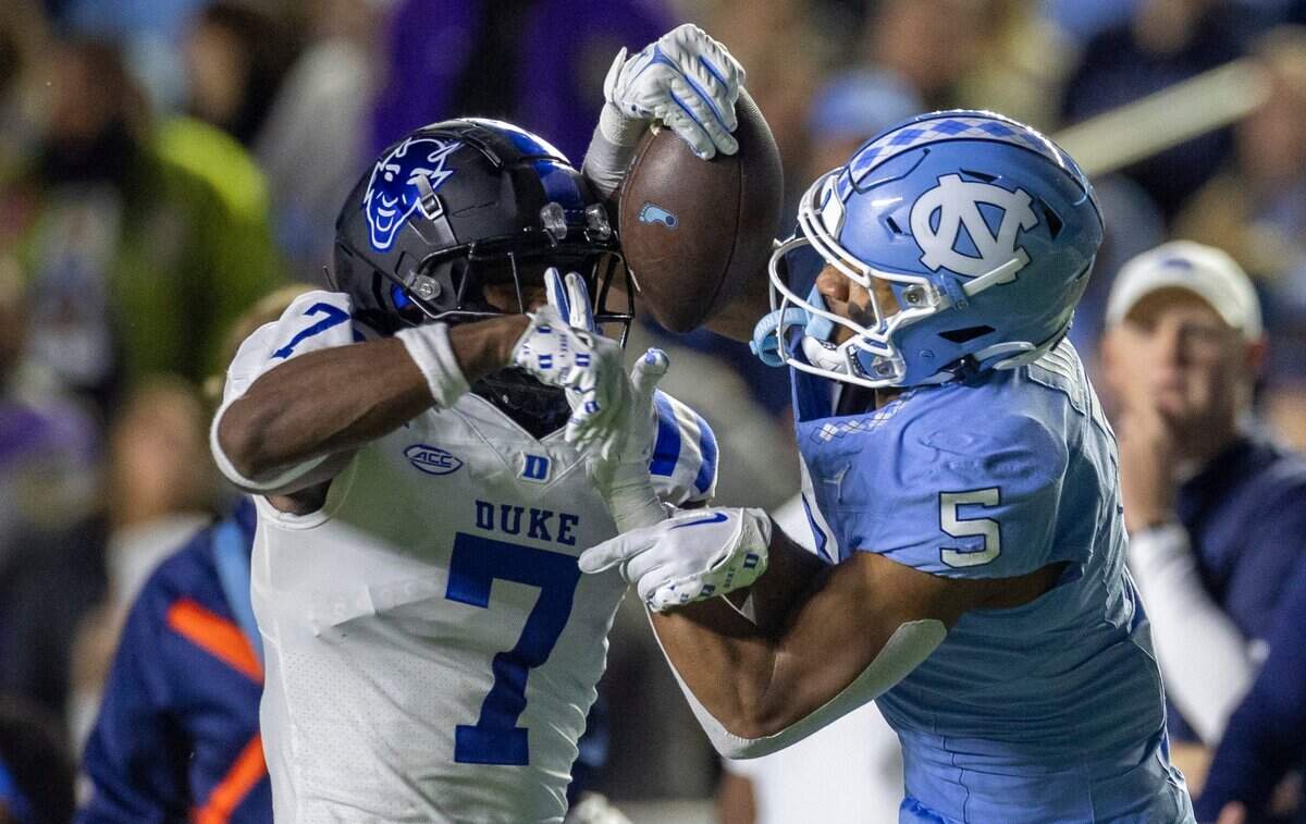 North Carolina’s J.J. Jones (5) picks up 31 yards on a pass completion from quarterback Drake Maye in the second quarter against Duke’s Al Blades Jr. (7) on Saturday, Nov. 11, 2023 at Kenan Stadium in Chapel Hill, N.C.