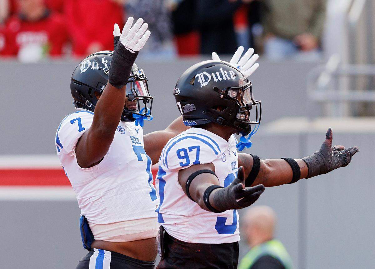 Duke’s Vincent Anthony Jr. and Wesley Williams react following a defensive stop during the first half of the Blue Devils’ game against N.C. State on Saturday, Nov. 9, 2024, at Carter-Finley Stadium in Raleigh, N.C. 
