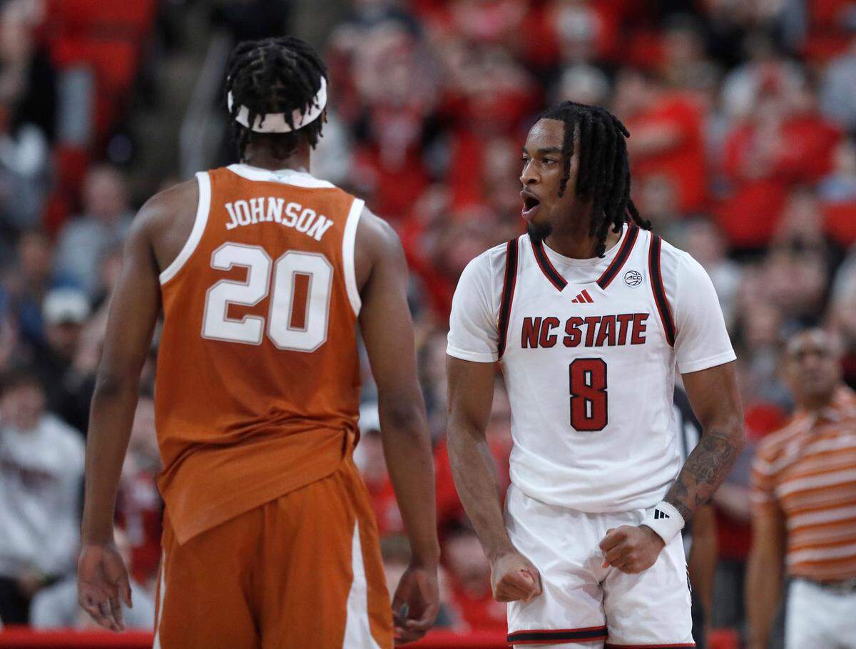 N.C. State’s Jayden Taylor reacts after forcing a Texas turnover during the second half of the Wolfpack’s 63-59 loss on Wednesday, Dec. 4, 2024, at Lenovo Center in Raleigh, N.C.