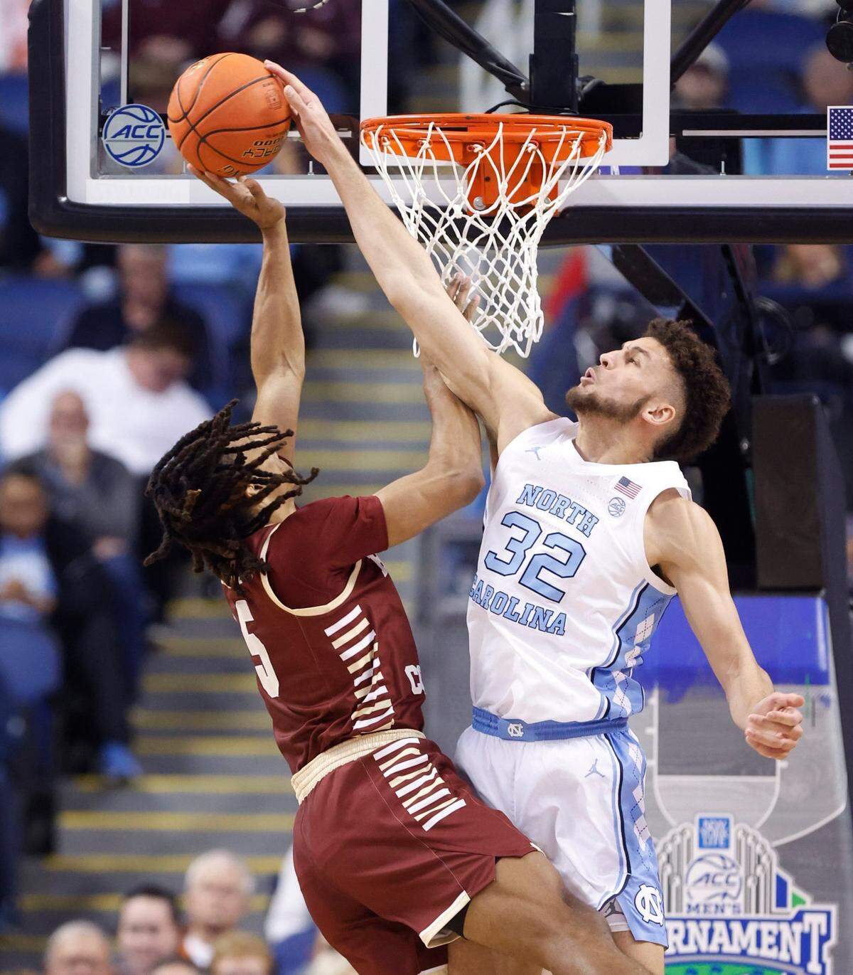 North Carolina’s Pete Nance (32) blocks the shot by Boston College’s DeMarr Langford Jr. (5) during the first half of UNC’s game against Boston College in the second round of the New York Life ACC Men’s Basketball Tournament in Greensboro, N.C., Wednesday, March 8, 2023.