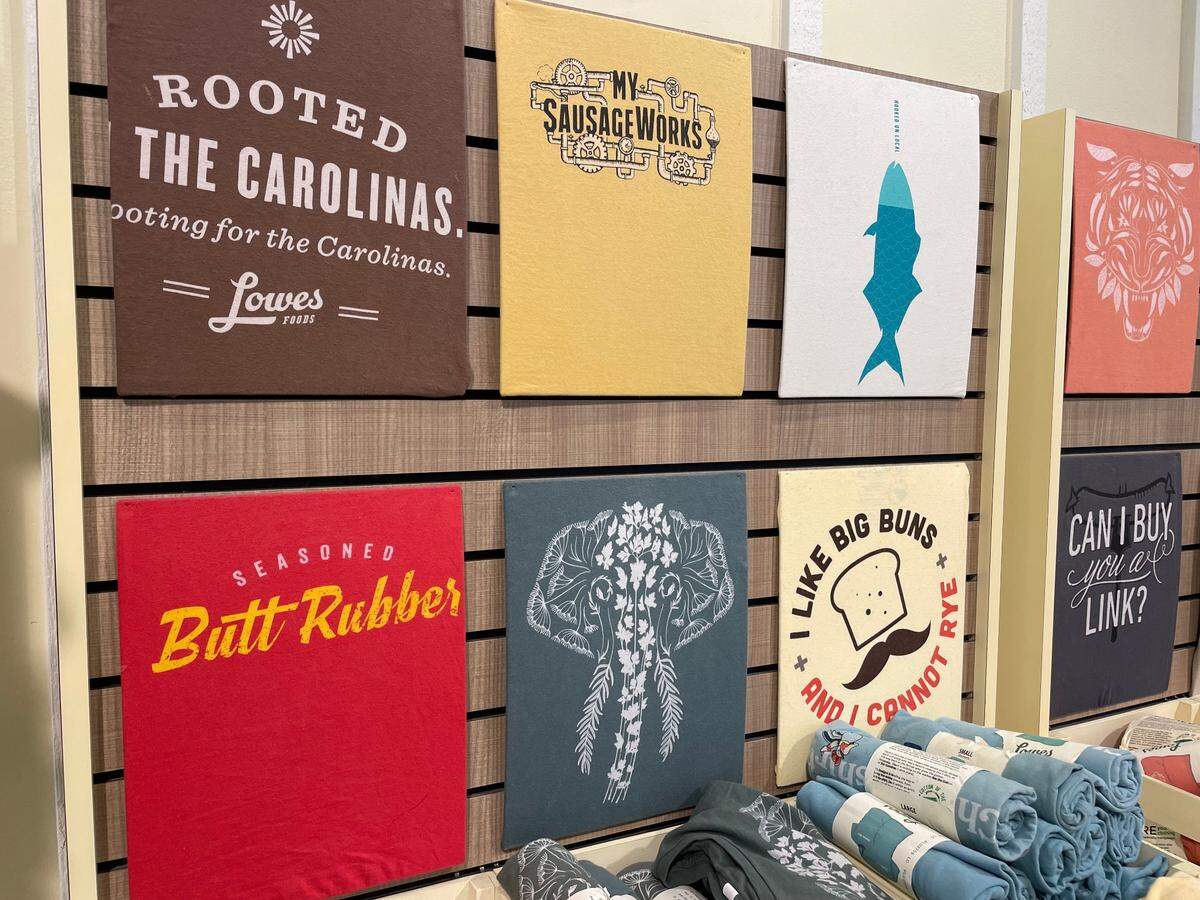 T-shirts for sale at Lowes Foods grocery store in Raleigh.