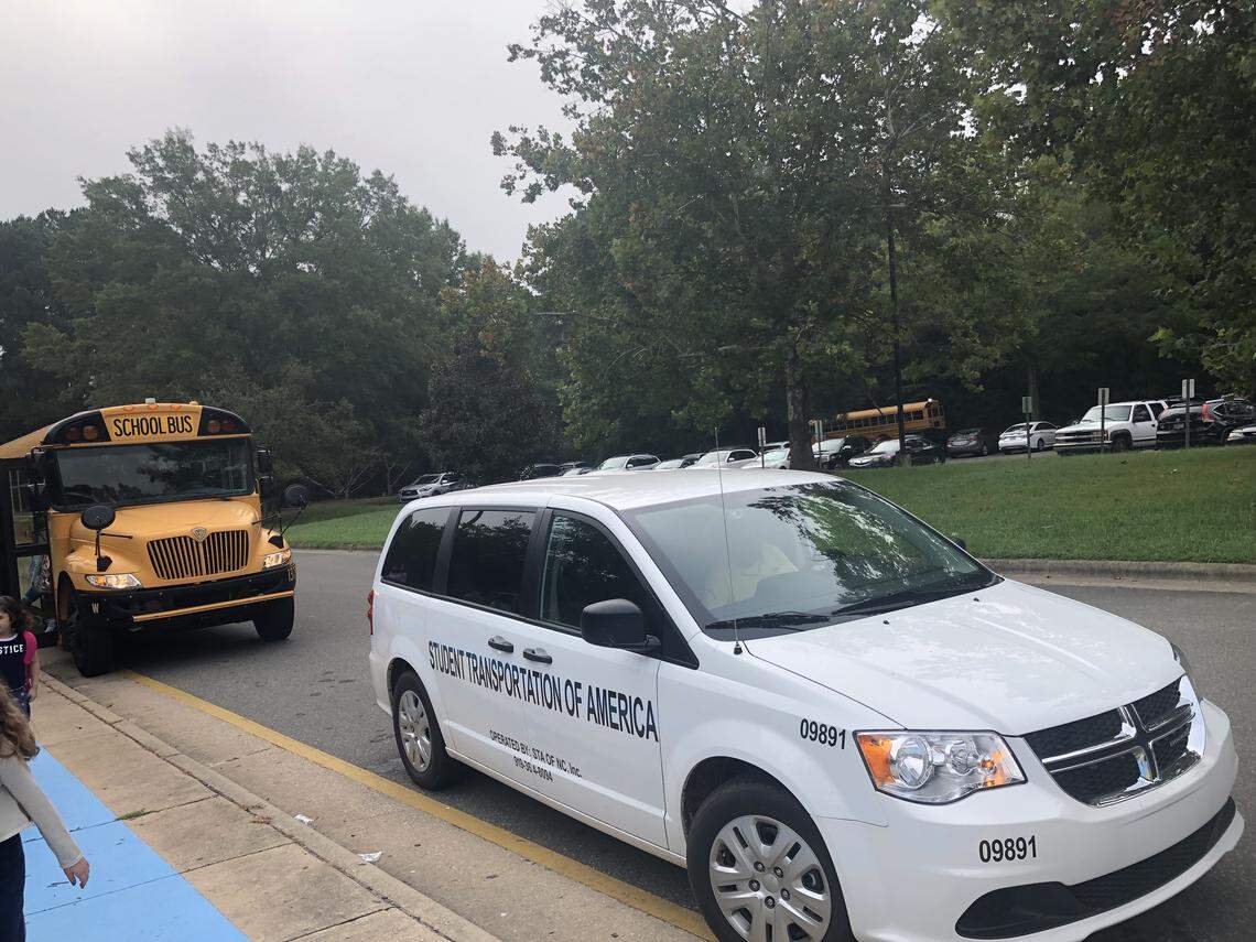 A vehicle from Student Transportation of America sits outside Fox Road Elementary School in Raleigh, NC, on Sept. 11, 2019 after dropping off a student at school.