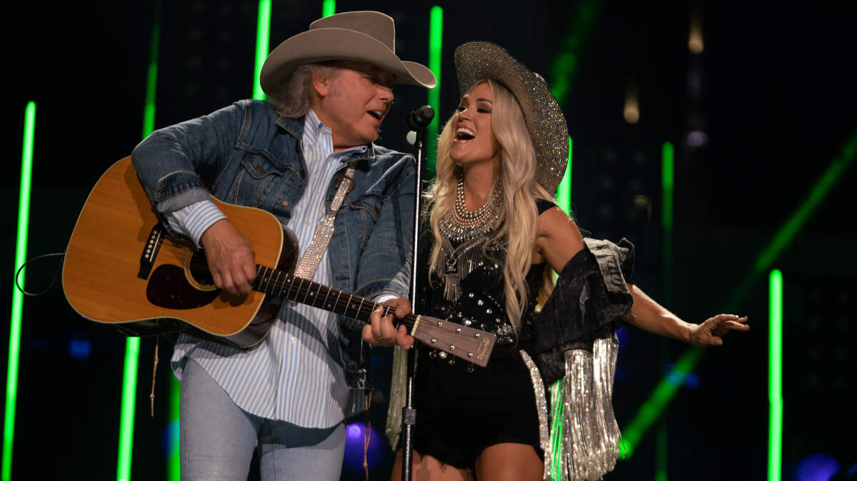 Dwight Yoakam and Carrie Underwood perform at the CMA Summer Jam in Nashville. The show airs Sept. 2 on ABC.