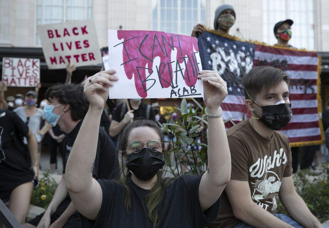 Baylee Baker and Marcus Cerrona of Durha, were among the hundreds of protestors who gathered for a rally on Monday, June 1, 2020 in the plaza at the Carolina Theatre in downtown Durham, N.C. Protestors were call for justice in George Floyd’s death in Minnesota.