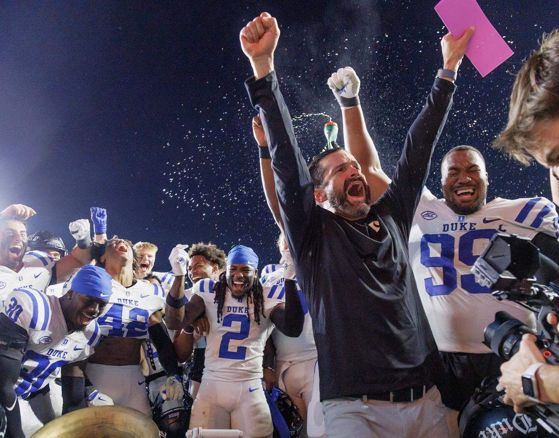 Duke head coach Manny Diaz celebrates following the Blue Devils’ 32-25 victory over North Carolina on Saturday, Nov. 22, 2025, at Kenan Stadium in Chapel Hill, N.C.
