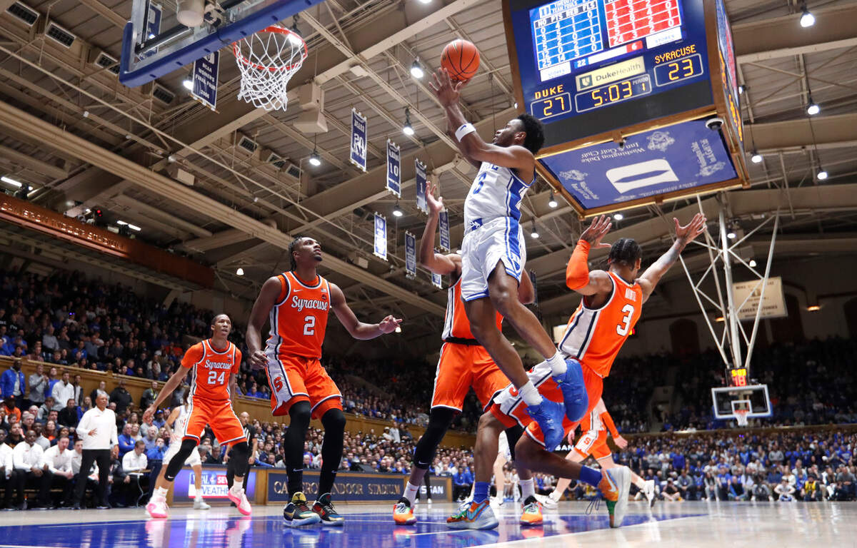 Duke’s Jeremy Roach (3) shoots during Duke’s 86-66 victory over Syracuse at Cameron Indoor Stadium in Durham, N.C., Tuesday, Jan. 2, 2024.