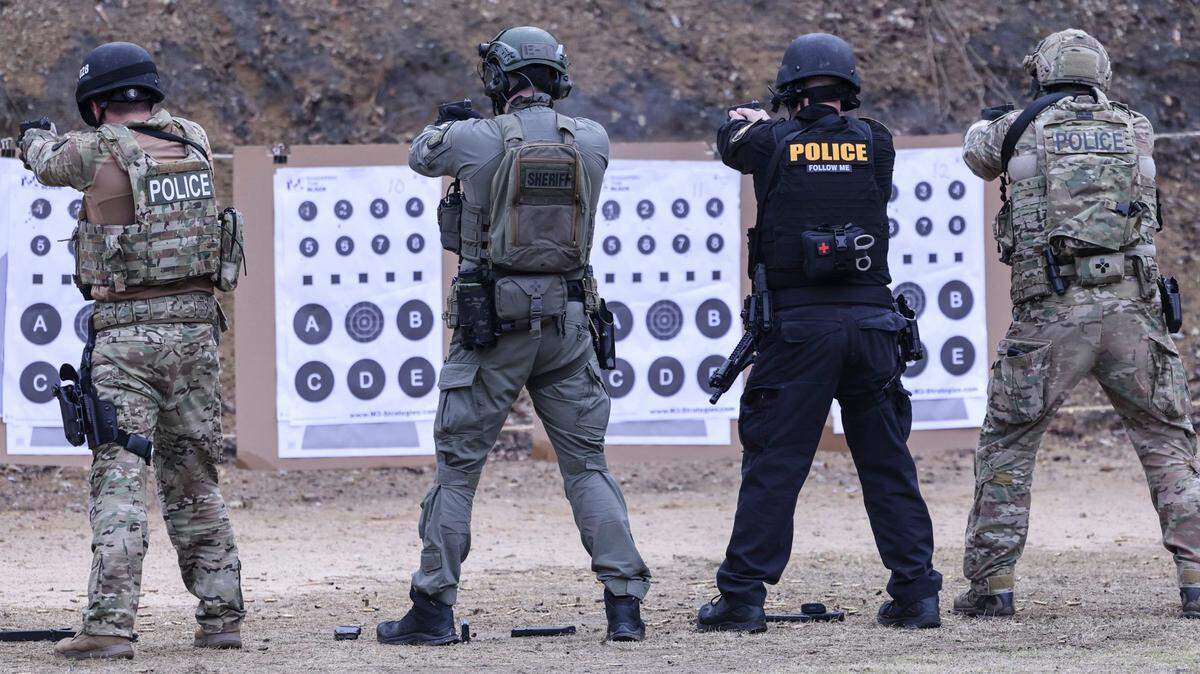 Law enforcement officers train in shooting fundamentals during a SWAT training class at the North Carolina Justice Academy in Salemburg Tuesday, Feb. 8, 2022. Lawmakers introduced a bill in April 2023 that they say would protect good cops who report bad cops. Most law enforcement groups weren’t so sure.