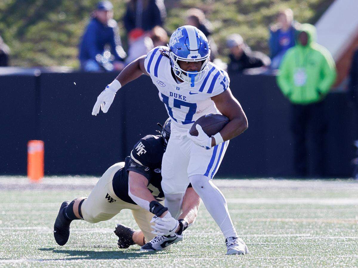 Duke’s Star Thomas runs the ball during the first half of the Blue Devils’ game against Wake Forest at Allegacy Stadium on Saturday, Nov. 30, 2024, in Winston-Salem, N.C.