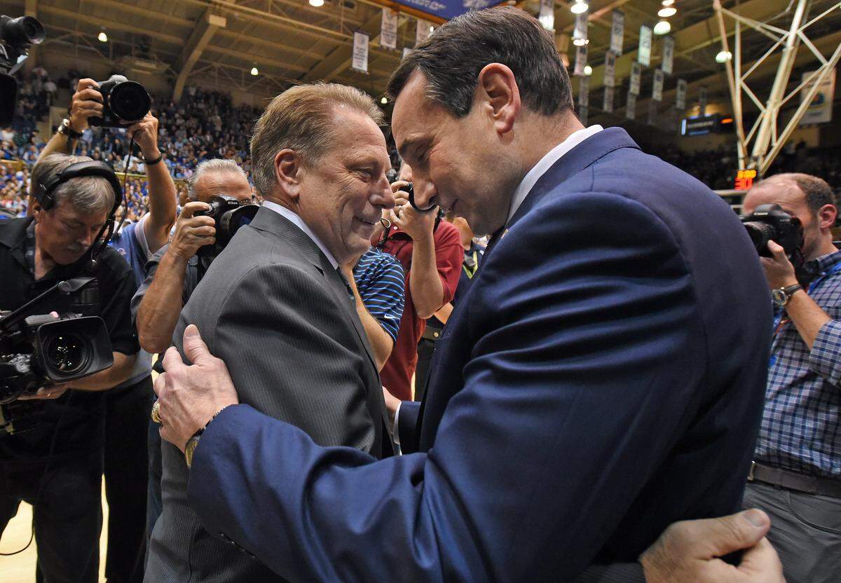 Michigan State head coach Tom Izzo and Duke head coach Mike Krzyzewski greet each other before the start of their ACC/Big Ten Challenge game. Duke beat Michigan State 78-69 at Cameron Indoor Stadium, Tuesday, Nov. 29, 2016 in Durham, N.C.