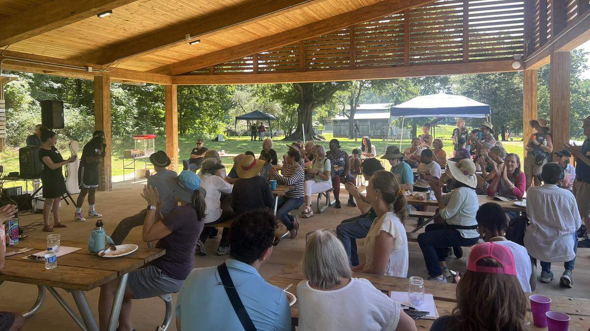Over 50 people attended an Orange County Democratic Party event Blackwood Farm Park in Chapel Hill on Aug. 9, 2025, to hear from people laid off as a result of DOGE-led cutbacks.