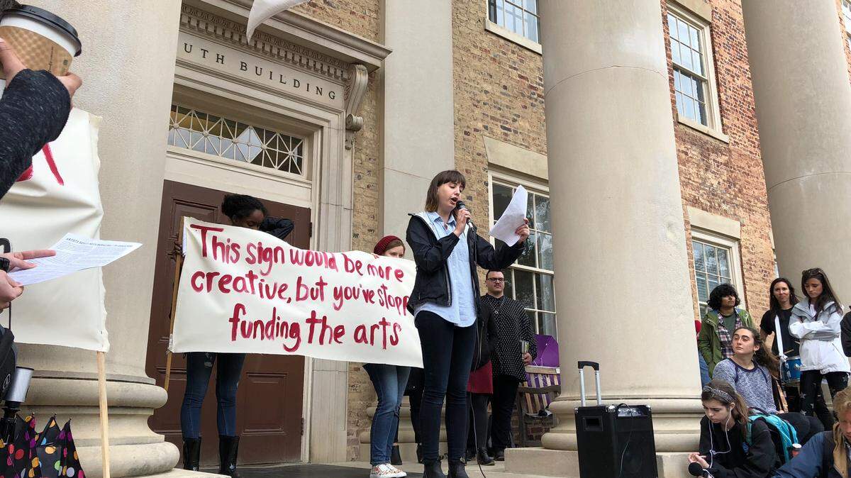 Art students protested lack of funding for their department outside UNC-Chapel Hill's South Building and the office of Chancellor Carol Folt.