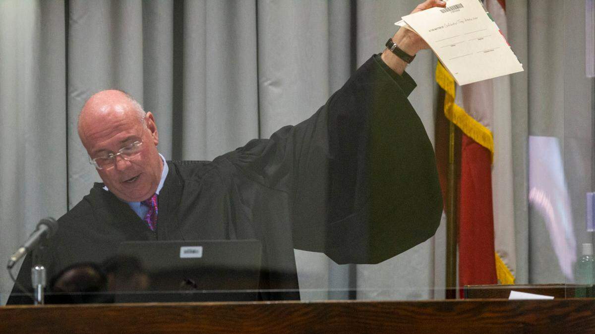 Judge David Hall presides over a hearing over sealed public records requested by The News & Observer at the Forsyth County Courthouse in Winston-Salem Monday, Feb. 8, 2021. The records could shed light on the actions of deputies in Winston-Salem that led to the death of John Neville while in jail.