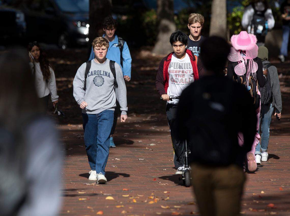 People walk through the campus of UNC-Chapel Hill on Monday, Oct. 31, 2022, in Chapel Hill, N.C. The U.S. Supreme Court on Monday will hear oral arguments in Students for Fair Admissions v. University of North Carolina, a case regarding race-conscious admission practices at institutions of higher education.