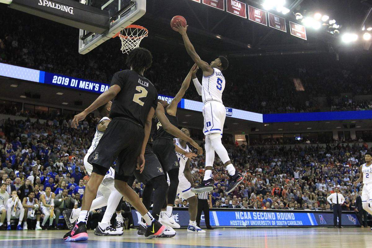 Duke’s RJ Barrett (5) makes what would be the winning shot with 11 seconds left after pulling in a rebound from a missed free throw by Zion Williamson during Duke’s 77-76 victory over UCF in the second round of the NCAA Men’s Basketball Championship in Columbia, S.C., Sunday, March 24, 2019.