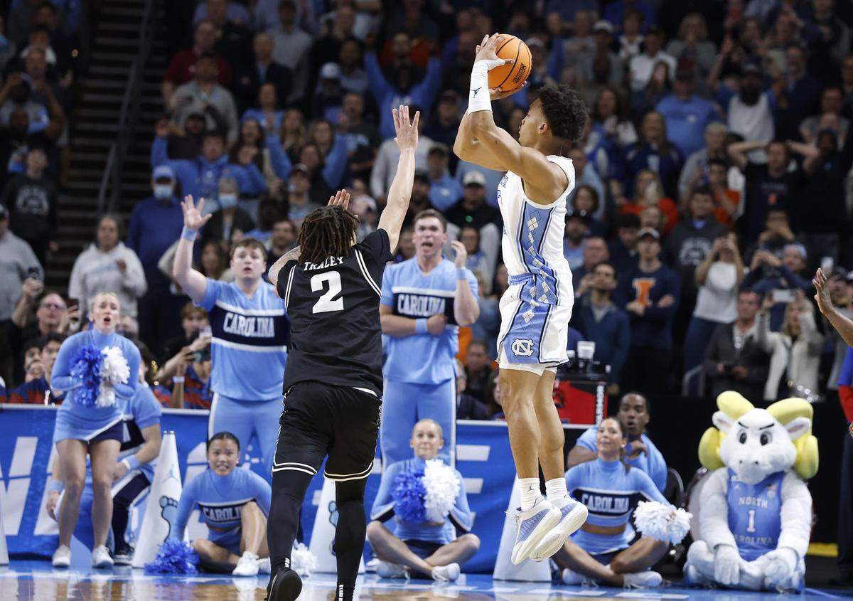 North Carolina's Seth Trimble (7) attempts a three-pointer as time expires in regulation during VCU’s 82-78 overtime victory over UNC in the first round of the NCAA Men’s Basketball Tournament at  Bon Secours Wellness Arena in Greenville, S.C., Thursday, March 19, 2026.