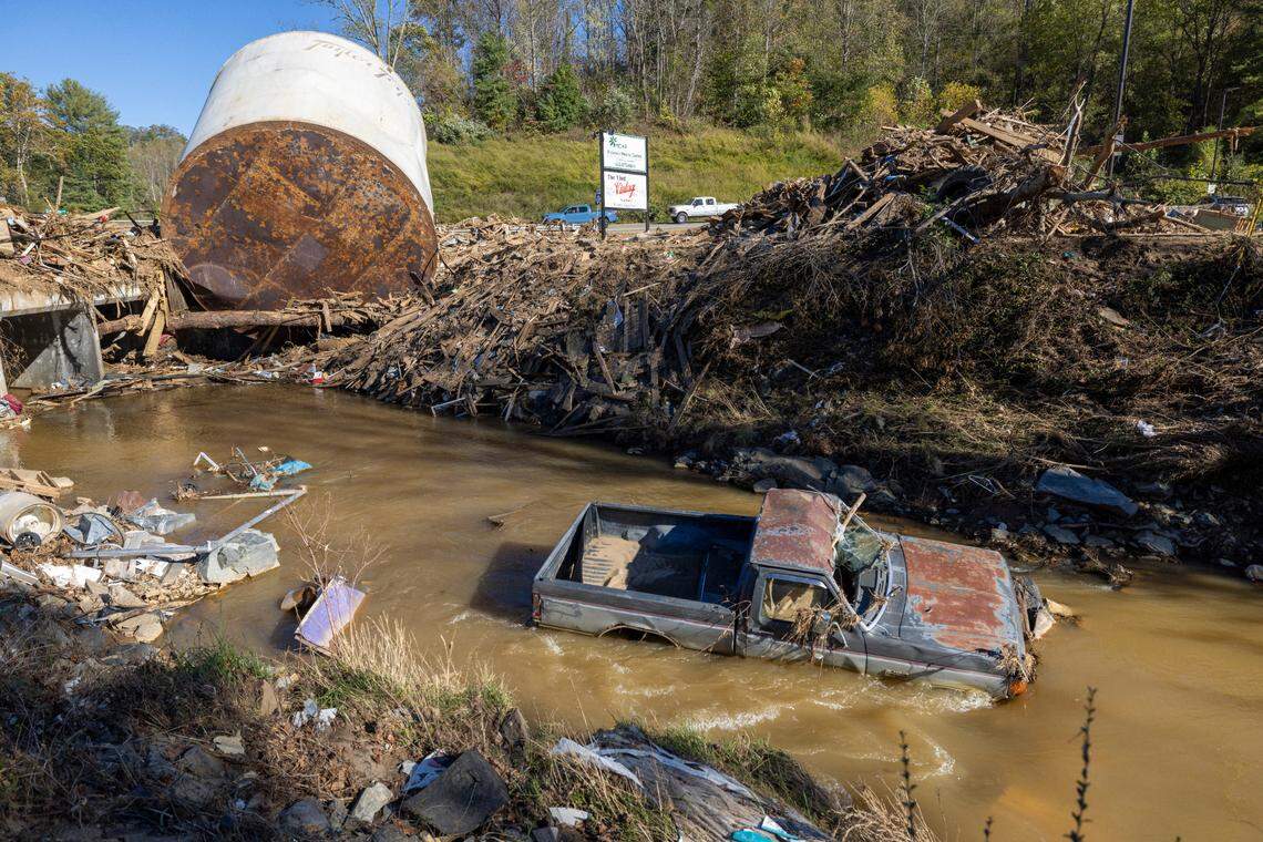 Little Crabtree Creek is littered with storm debris and vehicles three weeks after Hurricane Helene flooded the South Toe River and adjacent creeks near Micaville in Yancey County in 2024. Hurricane season runs from June 1 to Nov. 30.