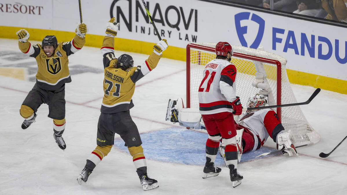 Vegas players Mitch Marner (93) and William Karlsson (71) celebrate after the game winning goal by Vegas defenseman Shea Theodore (27) to secure a 5-4 double overtime victory in Game 3 of the Stanley Cup Final, on Saturday, June 6, 2026 at T-Mobile Arena in Las Vegas, NV.
