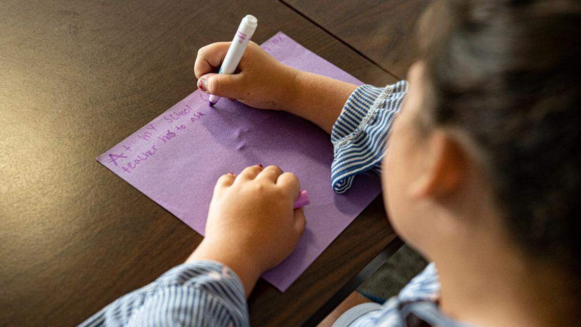 Laila Haddad, a 9-year-old Washington Elementary student, writes a letter to the legislators about her school’s need for funding through the Leandro Plan at the N.C. Legislative Building on Wednesday, June 29, 2022.