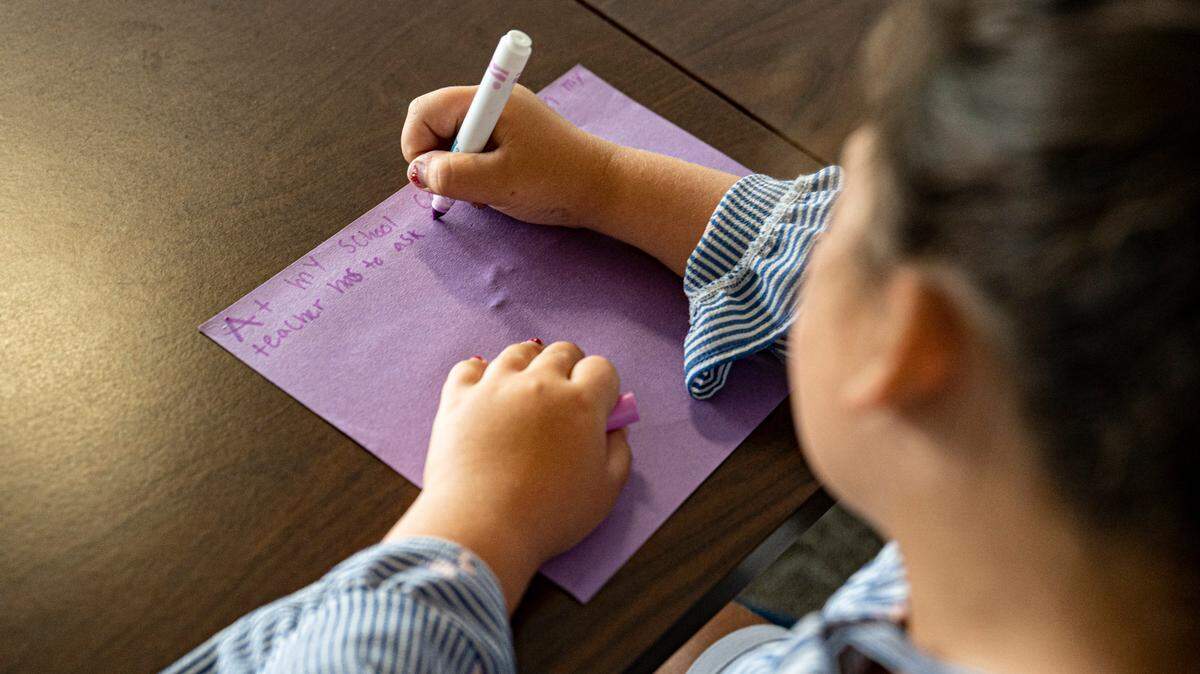 Laila Haddad, a 9-year-old student, writes a letter to the legislators about her school’s need for funding through the Leandro Plan at the N.C. Legislative Building on Wednesday, June 29, 2022.