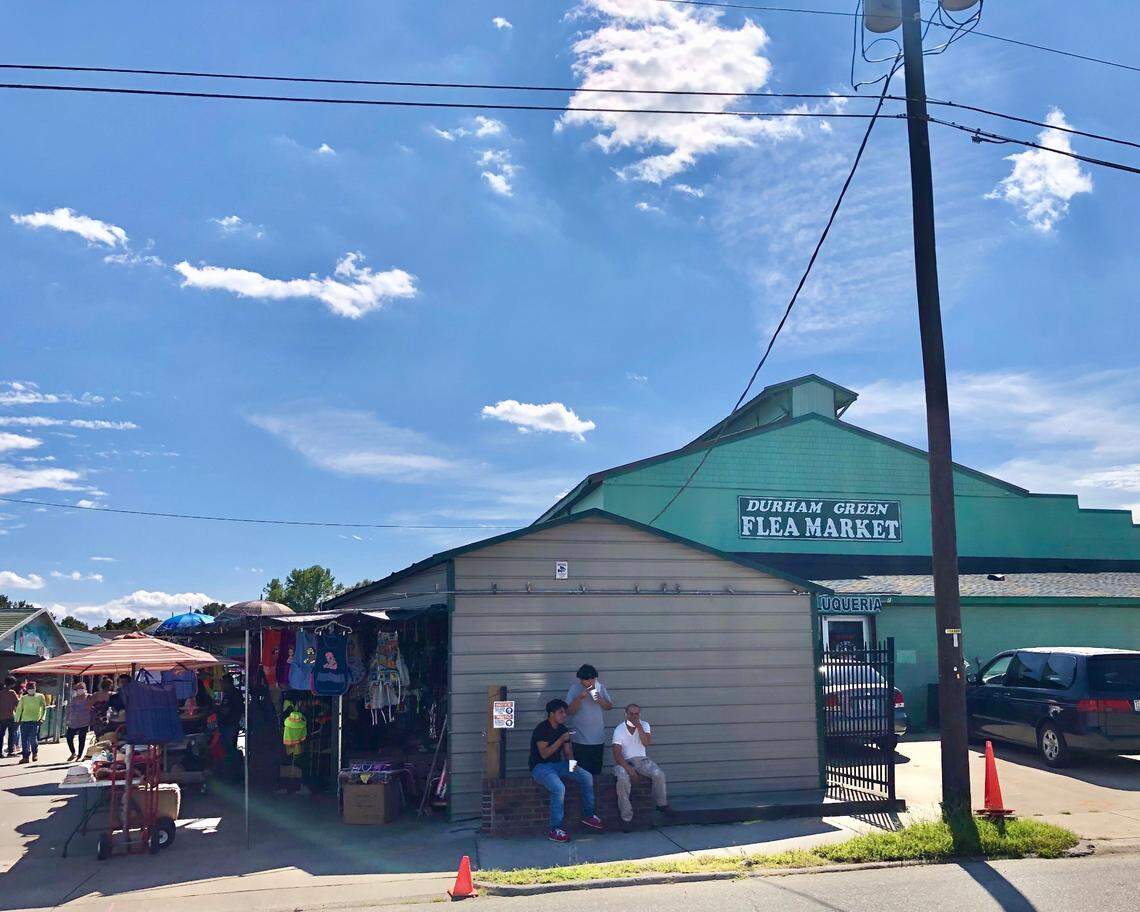 Patrons sit outside of the Durham Green Flea Market on a Saturday afternoon Sep. 4, 2021. The market on 1600 E. Pettigrew St. is on the market for $11 million.